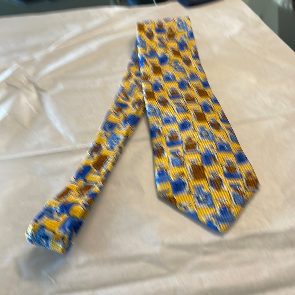 Givenchy tie, purfume bottle theme.